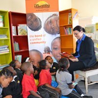 Photo of the iThemba children enjoying a story