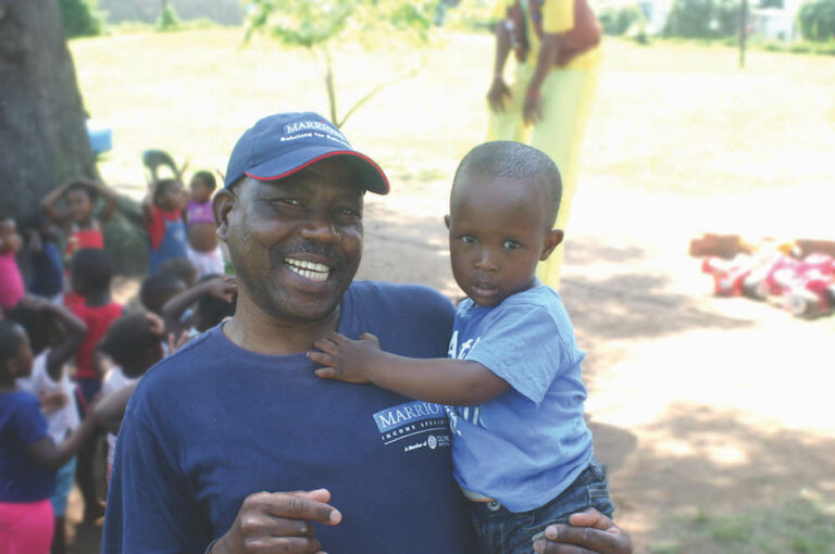 Rock of Hope Crèche children enjoy a party Sally Anderson, head of Marketing and Client Services at Marriott is pictured with Snenhlanhla Gumede at the Rock of Hope creche year end party. Patrick Zibula who handles maintenance at Marriott is pictured with Siyavuya Jula at the Rock of Hope Creche year end party