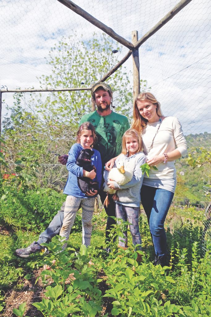 The Wilsons in their food garden