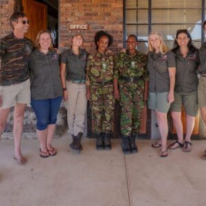 Craig Spencer, Carla Geyser, Jennifer Palmer, Tommi Wolfe, Bronwyn Laing and Emily Scott with two members of the Black Mamba Anti-Poaching Unit in SA, Felicia Mokokani, Colette Ngubeni (both in uniform). photo credit: Two Dustry Travellers)